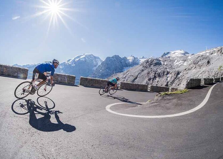 Stelvio, departure of the bikers - Alpine pass for cyclists
